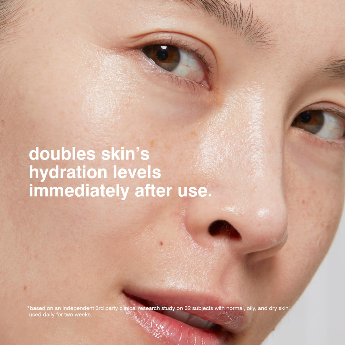 MALIN+GOETZ cream on hand illustrating quick absorption and non-greasy feel