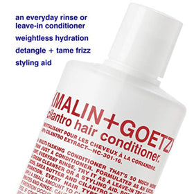 MALIN+GOETZ creamy conditioner texture close-up demonstrating lightweight slip