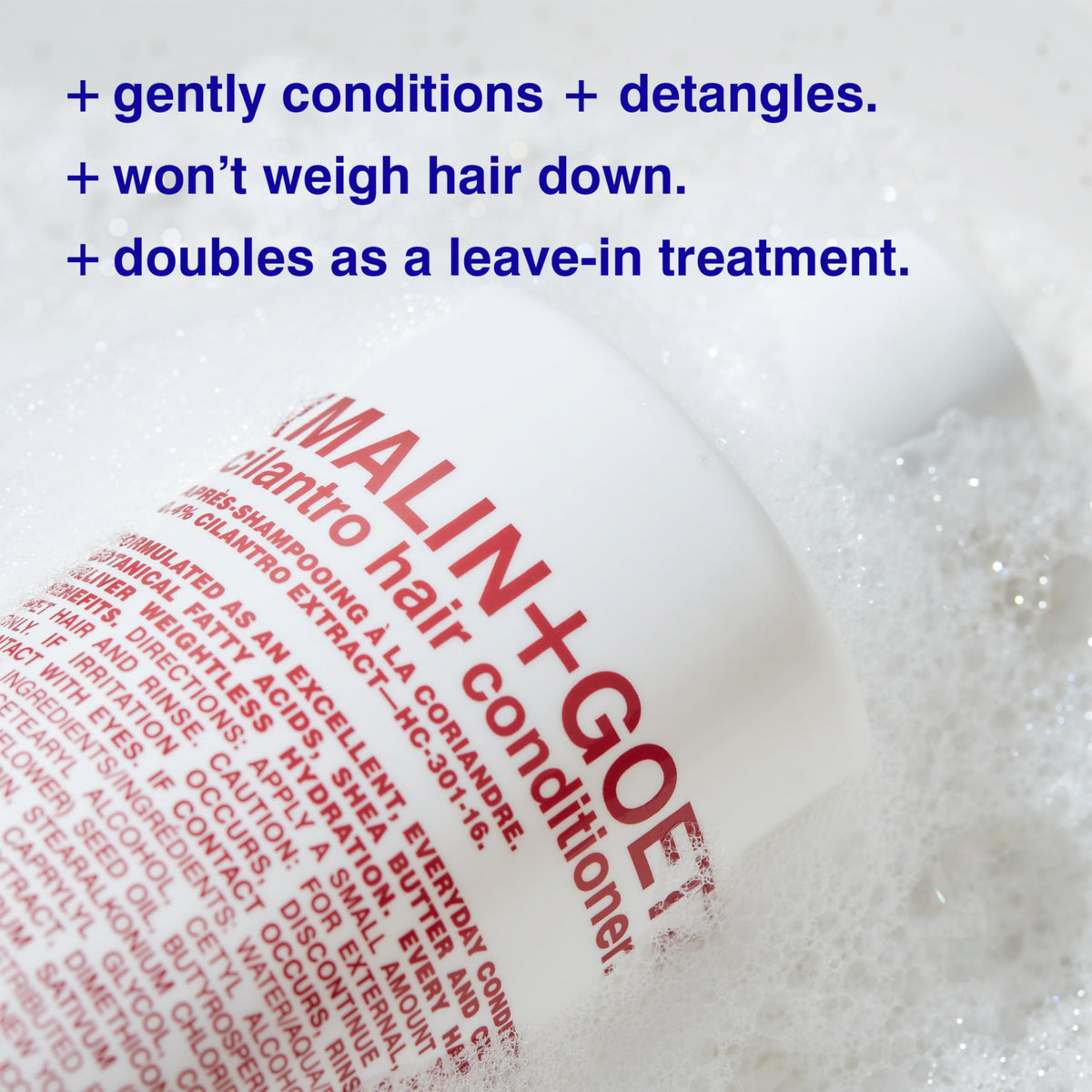 MALIN+GOETZ product dispensed on hand illustrating easy detangling benefit