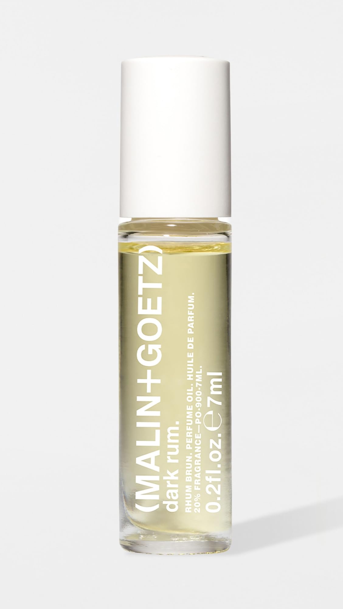 MALIN+GOETZ Dark Rum rollerball cap and label detail highlighting premium finish and clear branding