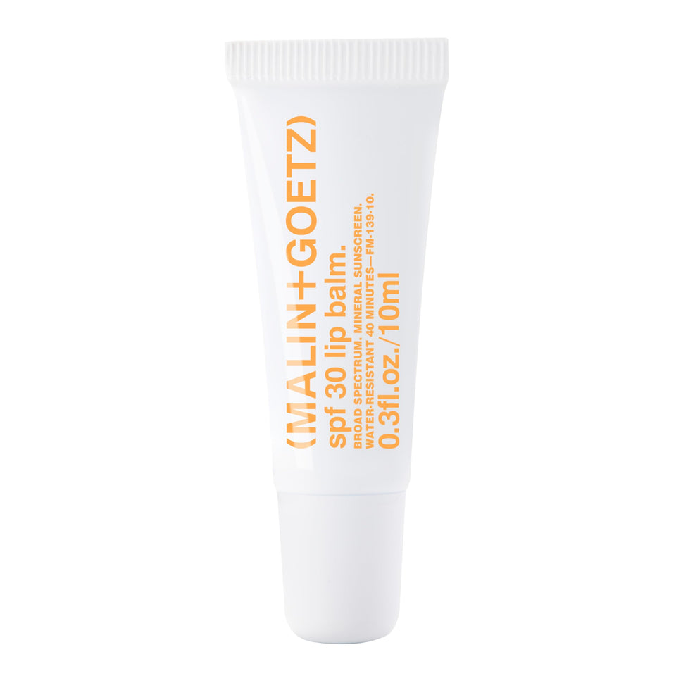 MALIN+GOETZ front view of SPF 30 lip balm showing label and tube, protective benefit