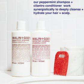 MALIN+GOETZ peppermint leaf close-up emphasizing natural extract and cooling effect