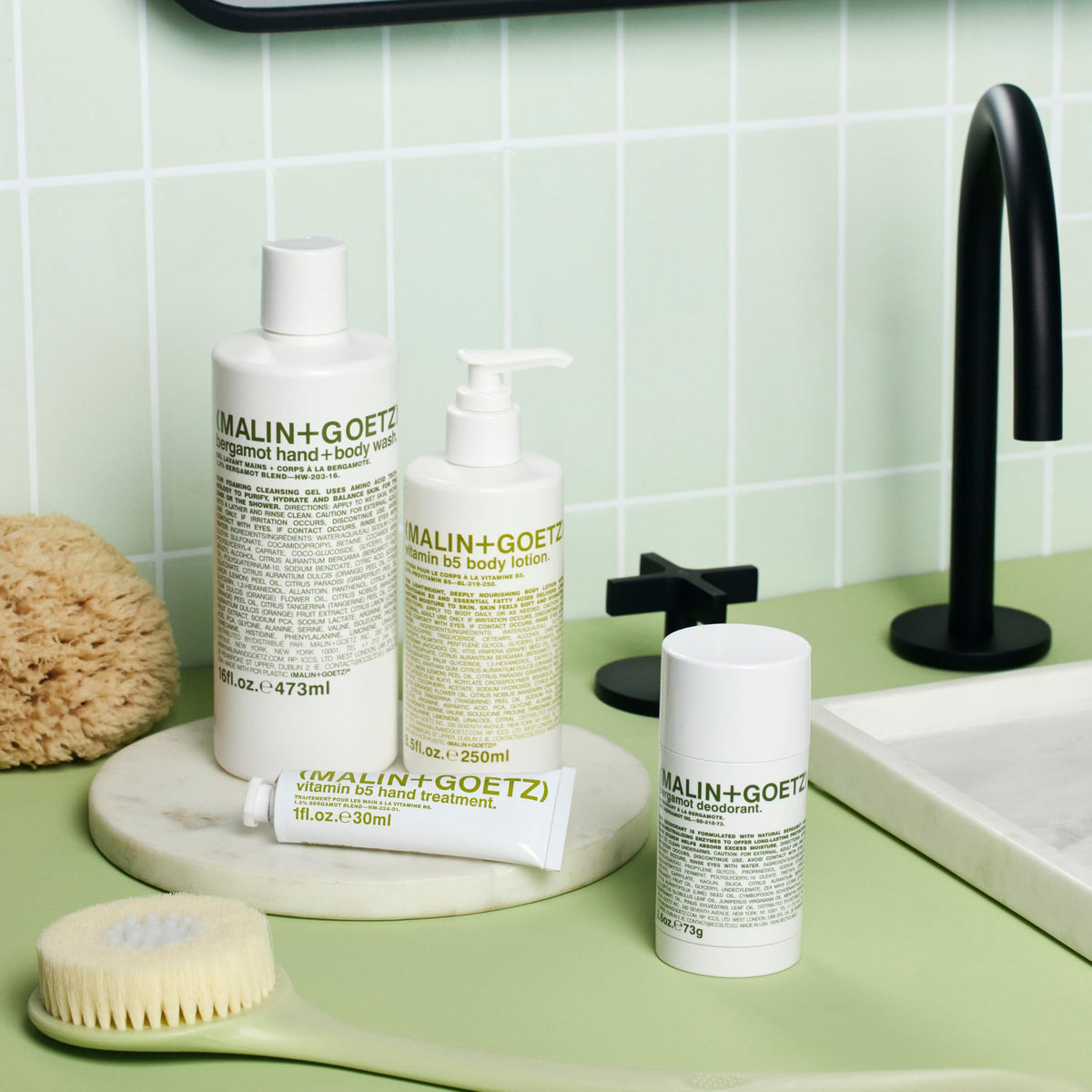 MALIN+GOETZ avocado grapeseed and shea butter ingredients conveying nourishing benefits