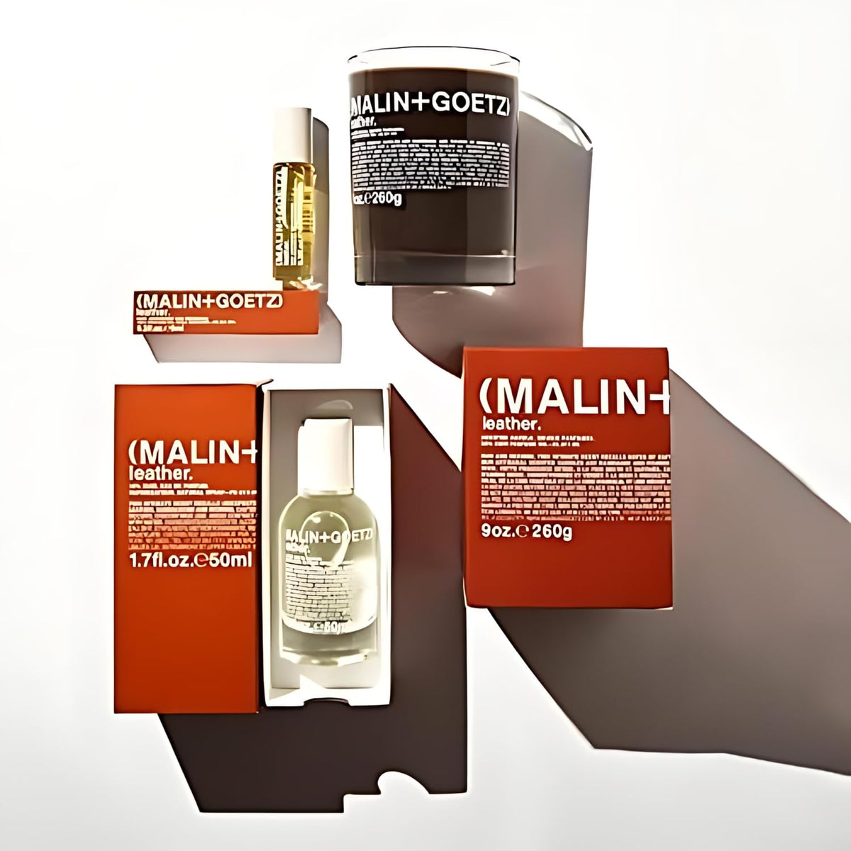 MALIN+GOETZ rollerball inside a purse showing compact size and travel-friendly benefit