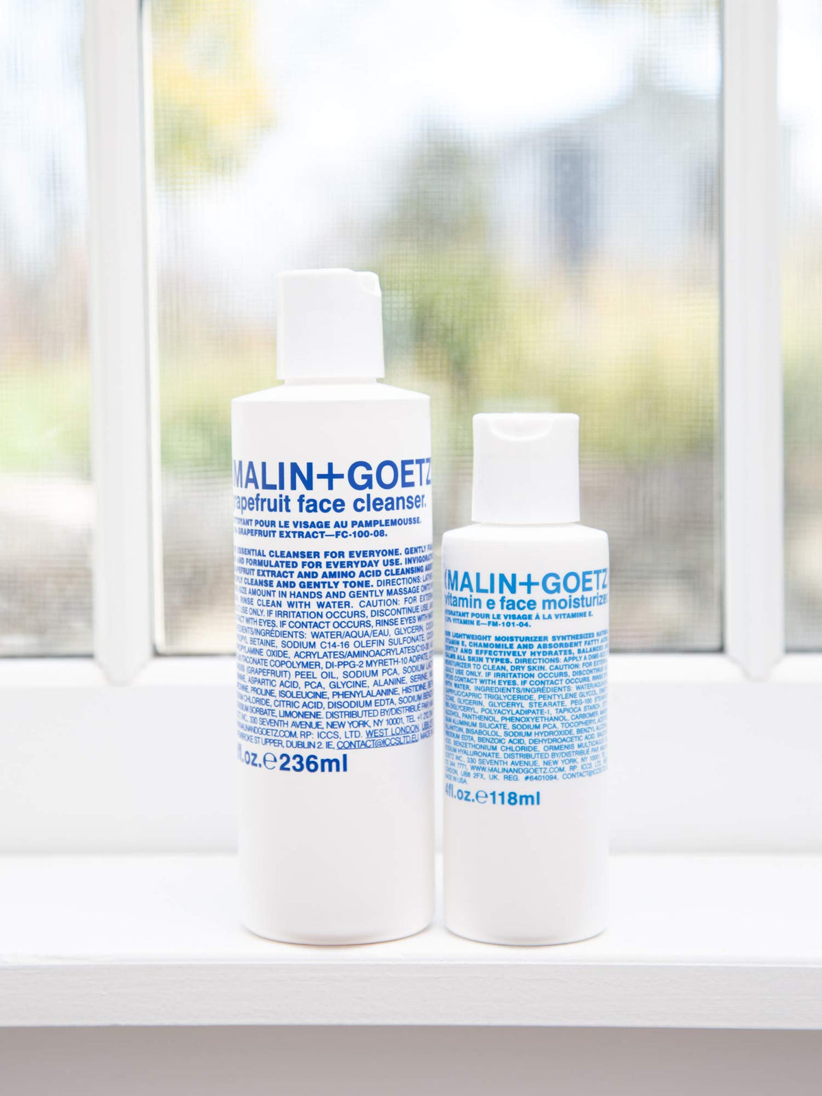 MALIN+GOETZ on bathroom shelf in lifestyle scene for simple routine inspiration