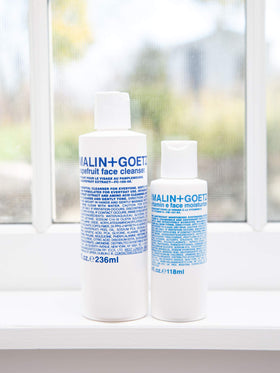MALIN+GOETZ on bathroom shelf in lifestyle scene for simple routine inspiration