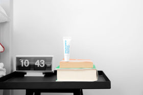 MALIN+GOETZ application on lips in everyday setting illustrating long-lasting protection