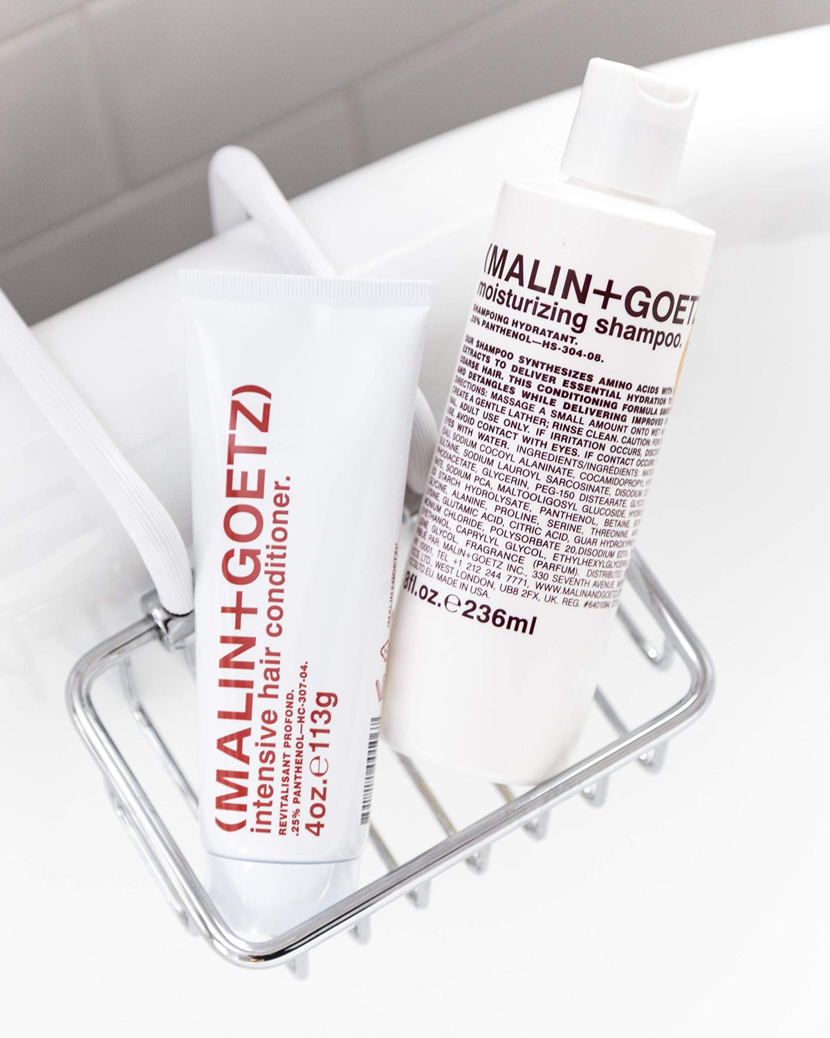 MALIN+GOETZ shampoo in bathroom setting showing everyday hydration ritual