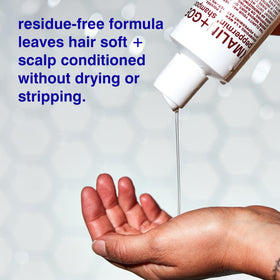 MALIN+GOETZ shampoo texture being poured highlighting gentle foam and mild cleansing