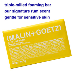Malin + Goetz close-up texture of rum bar soap, dense triple-milled bar for lasting use