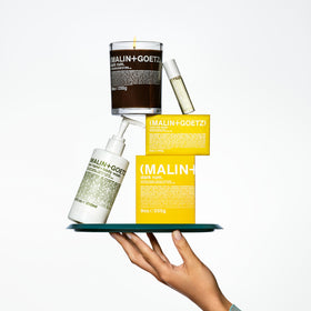 MALIN+GOETZ label ingredients shot highlighting vitamin B5 and nourishing oils