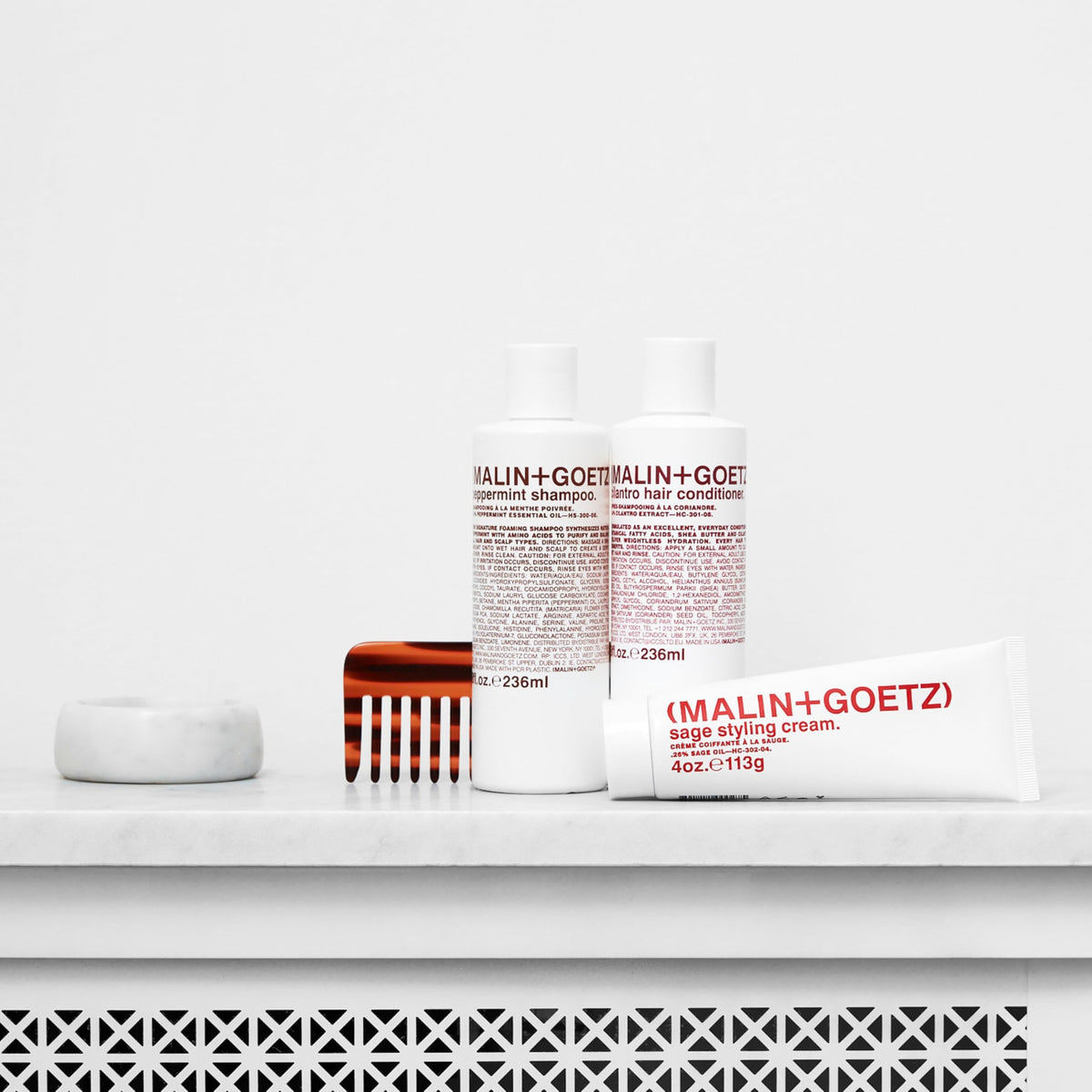 MALIN+GOETZ applied to wet hair reducing frizz and speeding styling