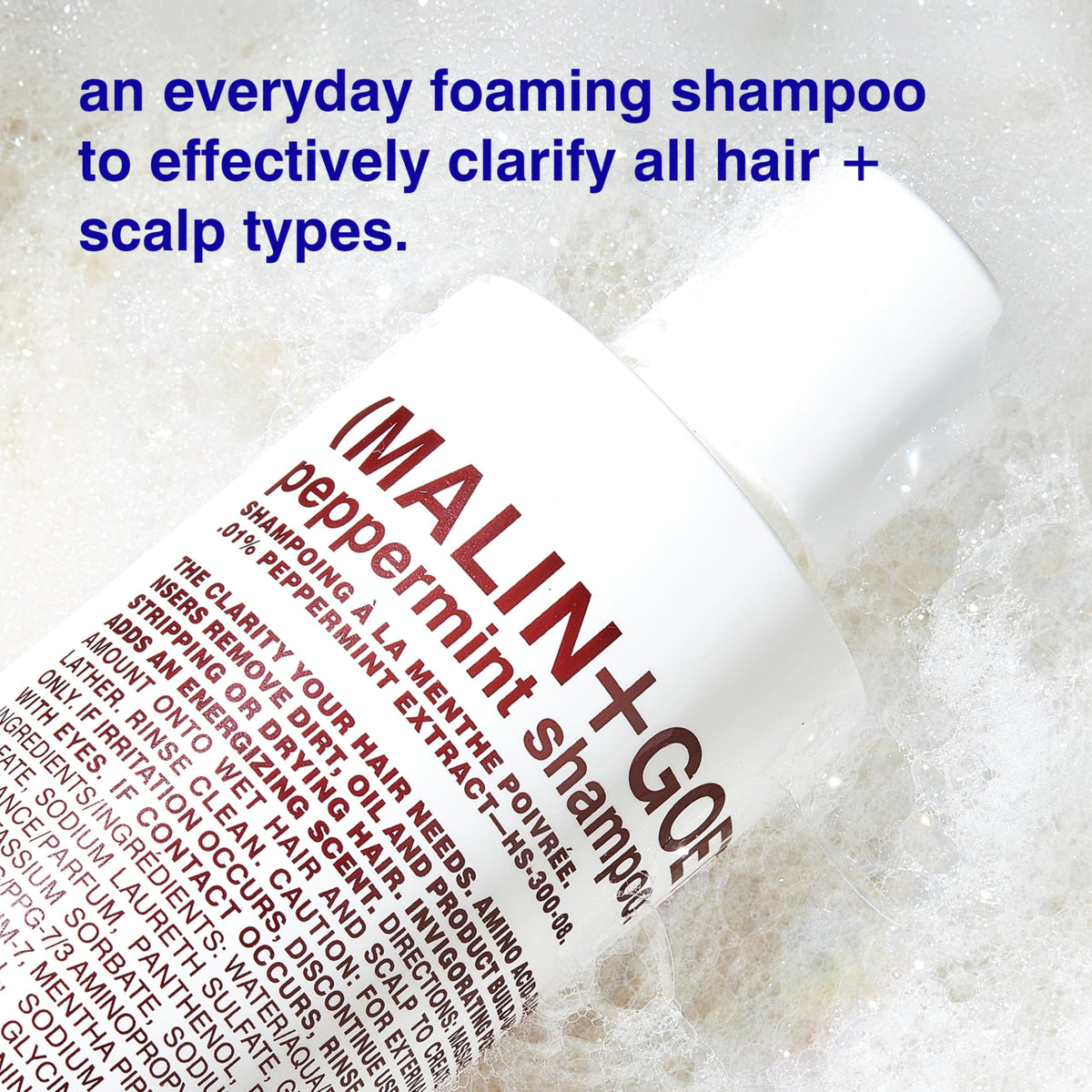 MALIN+GOETZ being applied to wet hair in shower demonstrating refreshing scalp sensation