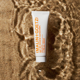 MALIN+GOETZ close-up of gel-cream texture demonstrating lightweight absorption and non-greasy finish