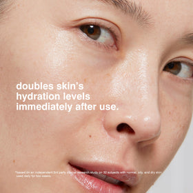 MALIN+GOETZ hand applying moisturizer to show smooth, non-greasy finish