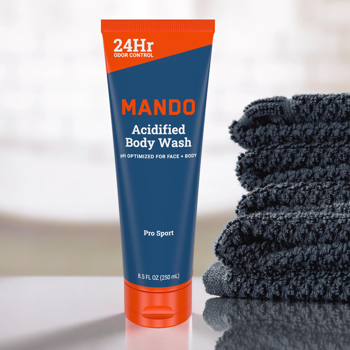 Mando bottle next to deodorant illustrating full-body odor control routine