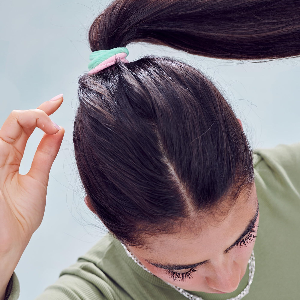Mane hair tie in a high ponytail on curly hair demonstrating secure hold and no snagging