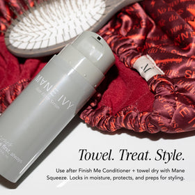 MANE IVY next to travel essentials showing compact 40ml size and on-the-go styling benefit