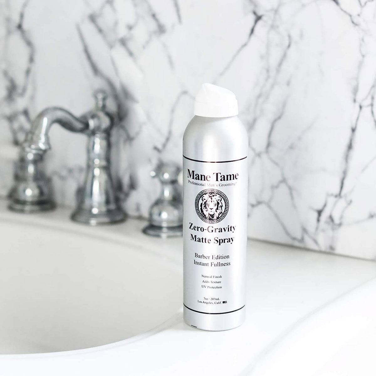 Mane Tame spray action on hair creating instant texture and lift