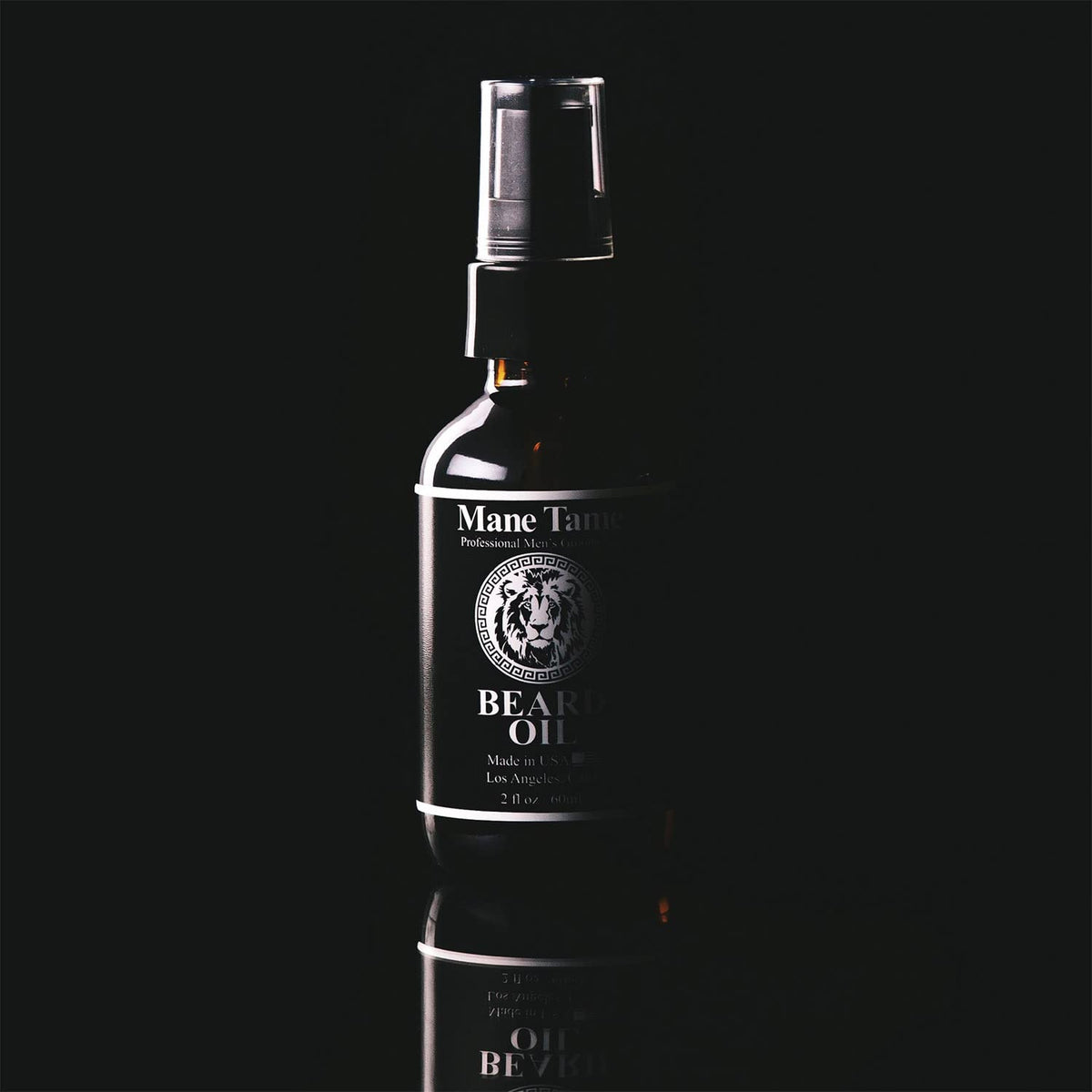 Mane Tame oil drops on hand displaying lightweight texture and fast absorption