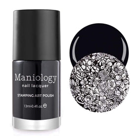 Close-up of stamped nail plate with Maniology polish showing crisp detail
