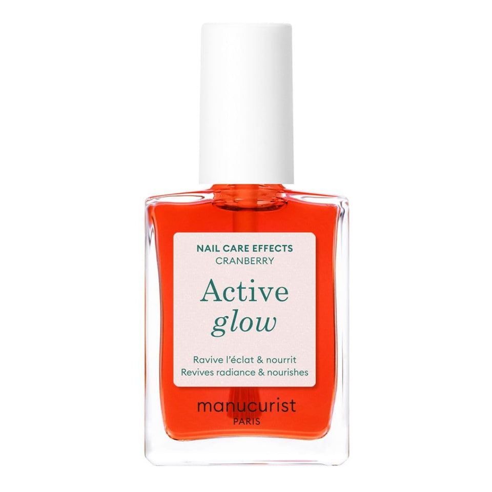 Manucurist Active Glow Cranberry front bottle showing coral-tinted polish and sleek packaging benefit: instant gloss