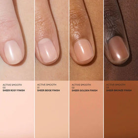 Manucurist hand in lifestyle setting showing subtle rosy finish benefit