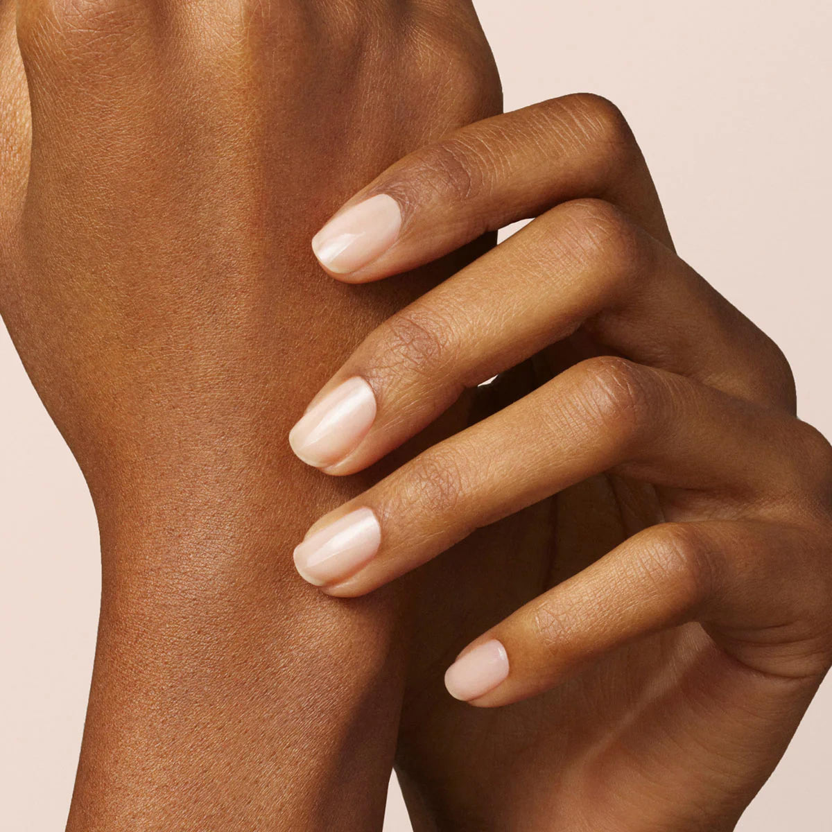 Manucurist beige swatch on nail wheel showing true nude color