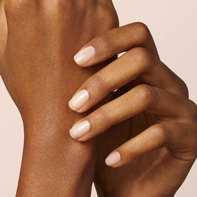 Manucurist beige swatch on nail wheel showing true nude color