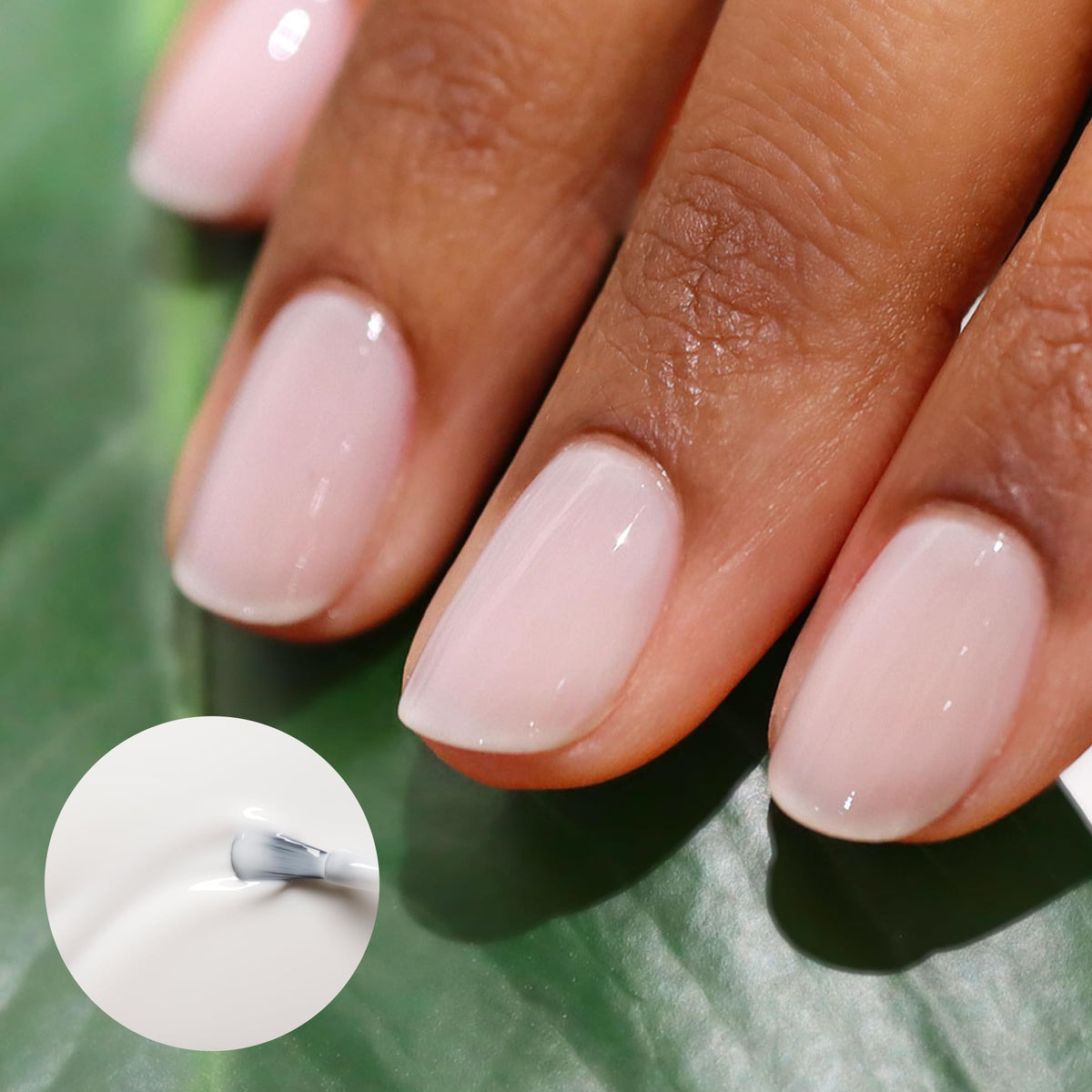 Manucurist brush close-up spreading polish smoothly for streak-free application