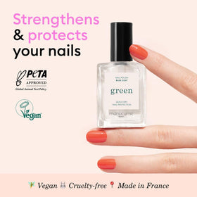Close-up texture of Manucurist green base coat highlighting smooth nourishing formula