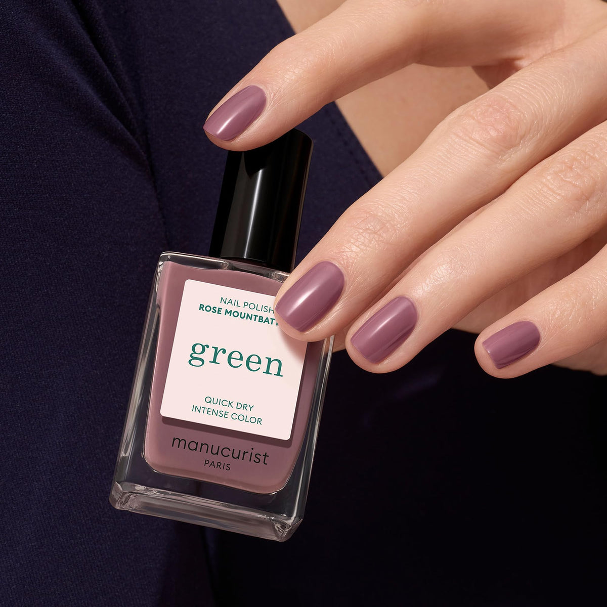 Manucurist swatch on nails illustrating taupe-pink color and wearable look benefit