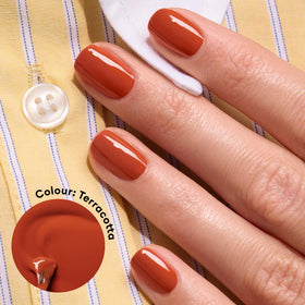 Manucurist brush applying polish, demonstrating smooth even application benefit