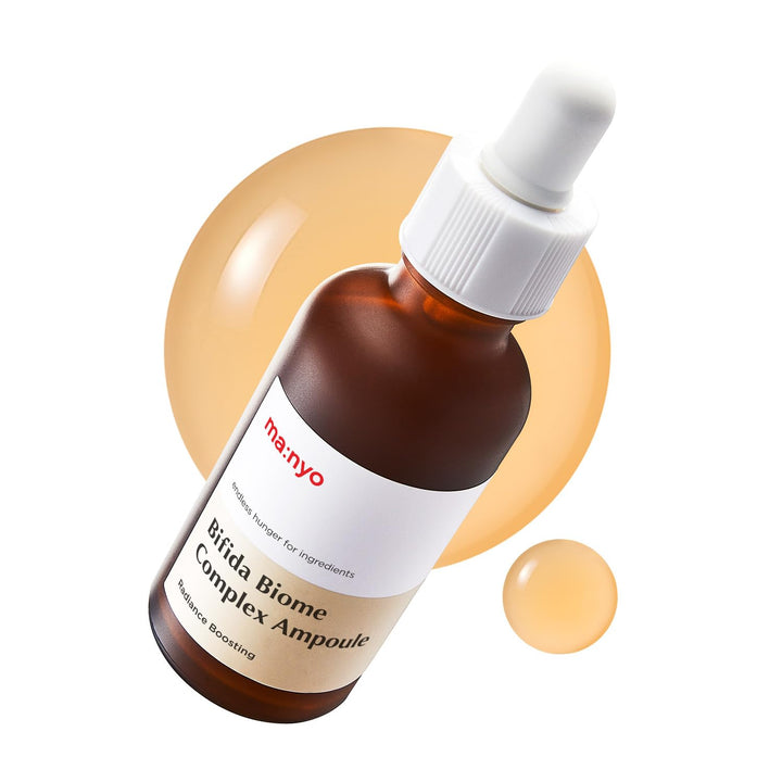 ma:nyo front bottle shot showing sleek ampoule and glow benefits