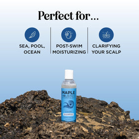 Maple Holistics adult rinsing hair at the beach for fresh post-swim feel