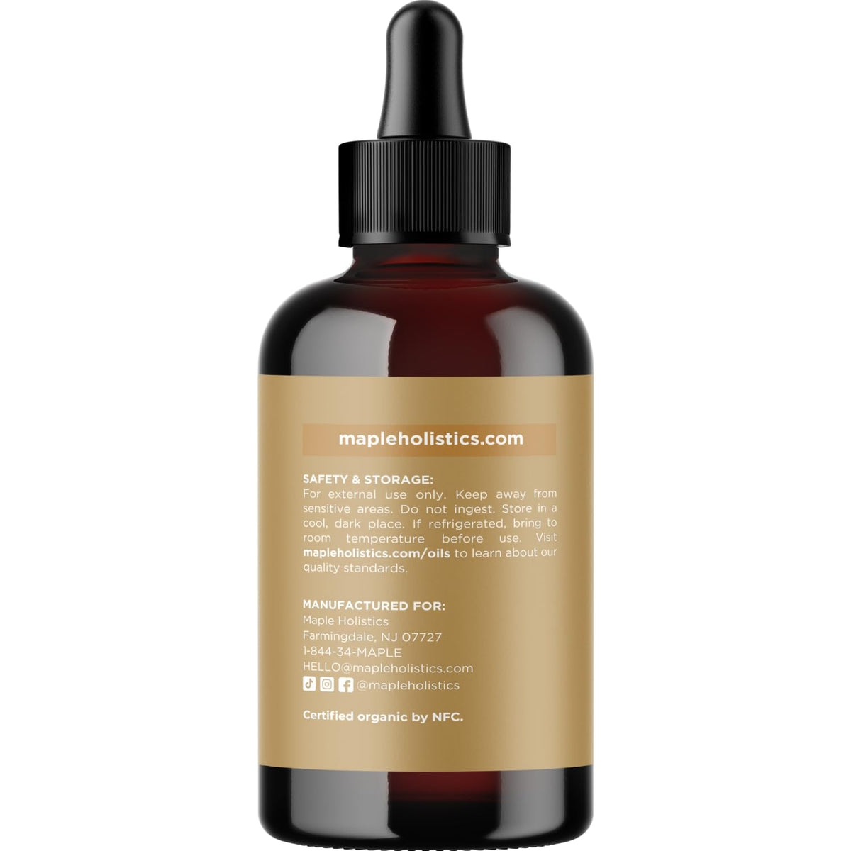 Maple Holistics dropper mixing jojoba with essential oils for safe dilution
