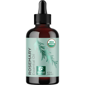 Maple Holistics rosemary oil staged with hairbrush and towel for scalp care benefits