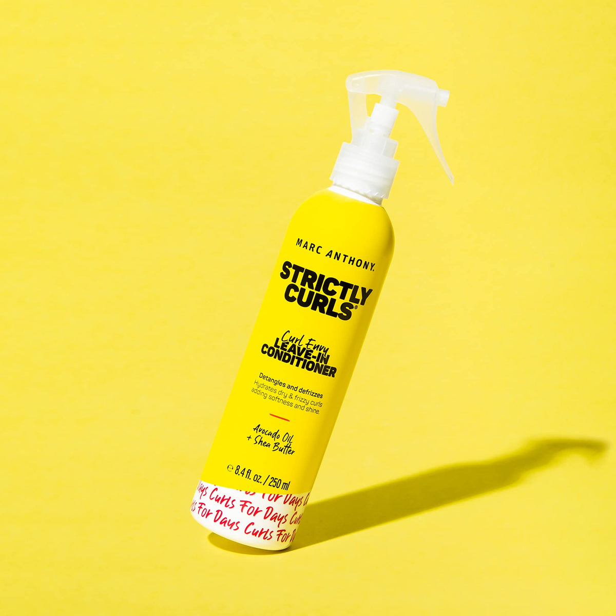 Marc Anthony application on wet hair illustrating detangling benefit and curl definition