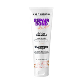Marc Anthony front bottle showing Repair Bond shampoo and professional branding for clear identification and trust
