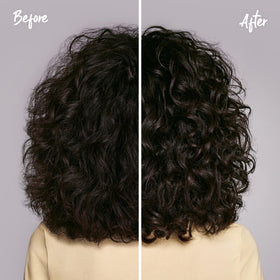 Marc Anthony shampoo in shower on wet curls demonstrating gentle cleanse