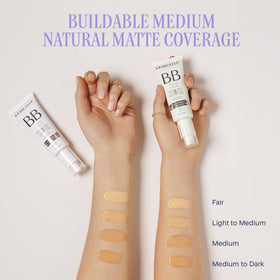 Marcelle BB Cream applied by model in lifestyle scene showing natural-looking coverage and glow
