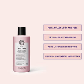 Maria Nila label detail and pump top, emphasizes clean ingredients and easy dispensing