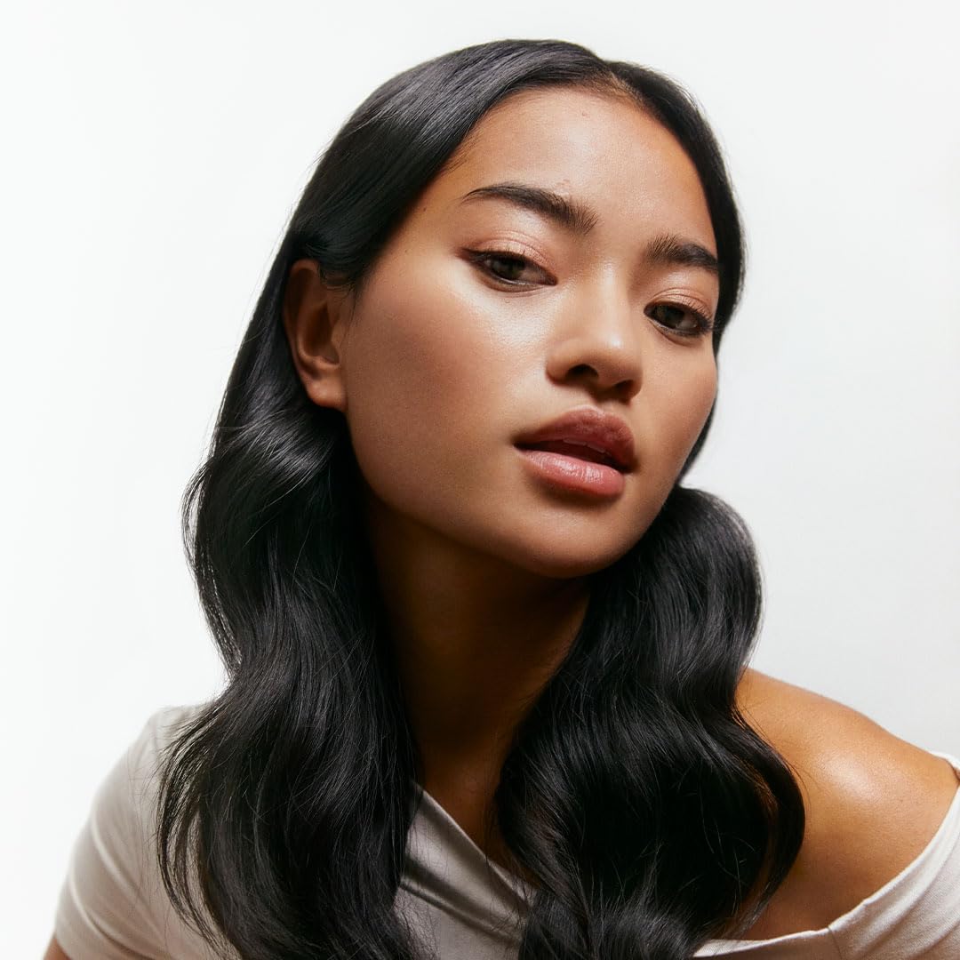 Maria Nila used during styling showing smoother hair and reduced frizz for polished results benefit