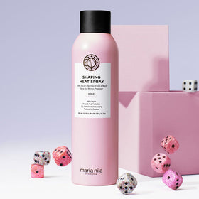 Maria Nila spray mist texture in air illustrating even coverage and lightweight protection benefit