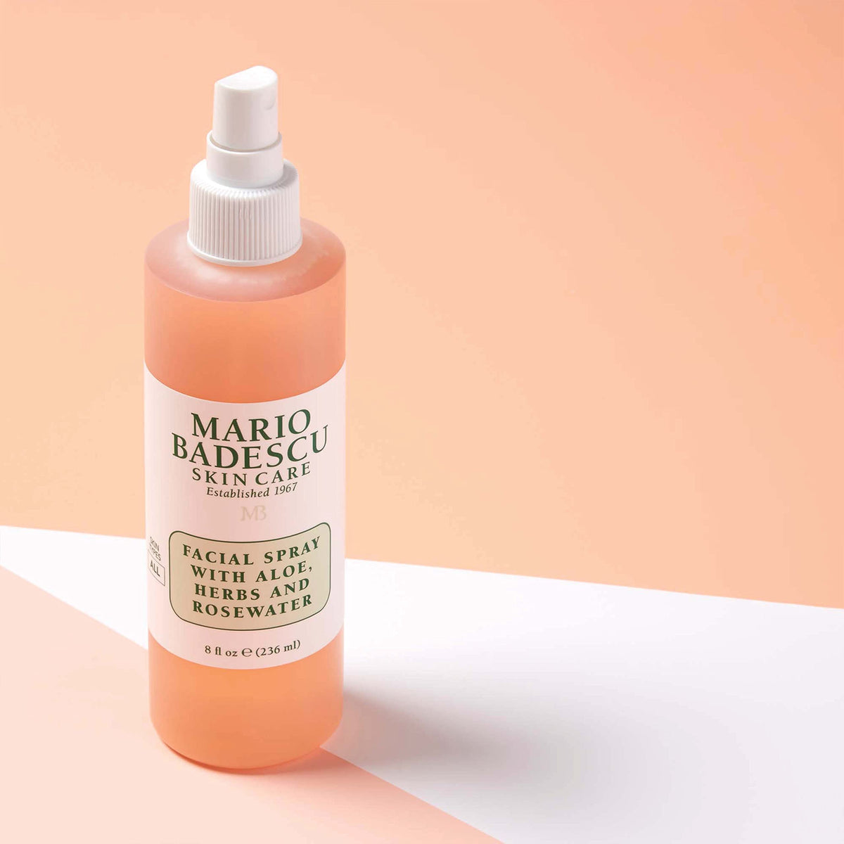 Mario Badescu facial spray being applied to face for dewy finish
