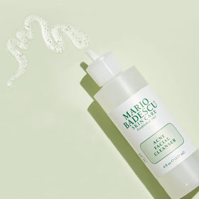 Mario Badescu bottle on bathroom shelf suggesting daily routine integration