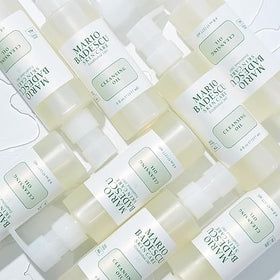 Mario Badescu cleansing oil on vanity in a bathroom setting suggesting a calming skincare ritual