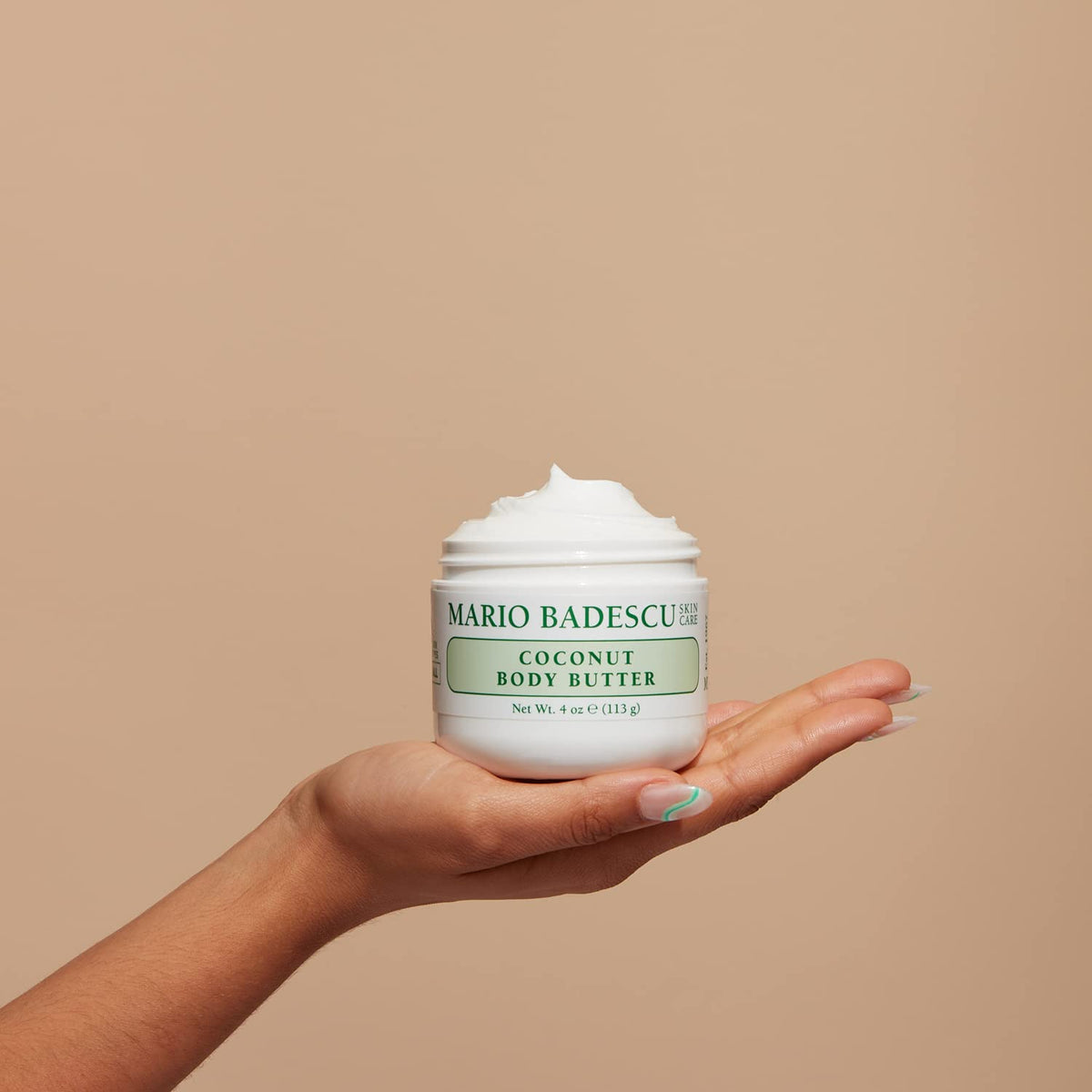 Mario Badescu applied to elbow and knee demonstrating targeted smoothing benefit