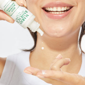 Mario Badescu back label close‑up listing ingredients and usage benefits