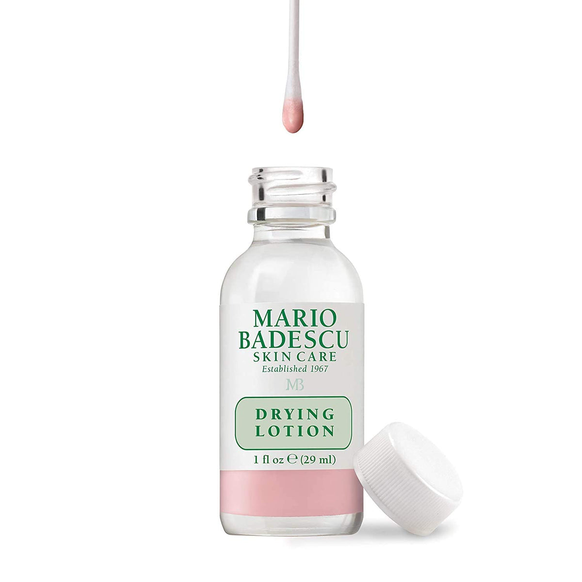 Mario Badescu close-up of pink sediment in bottle highlighting active ingredients